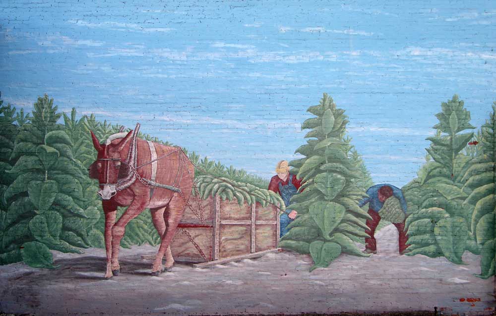 Mural of old time tobacco harvest by Carolyn Brown, next to Hemingway Fire Department